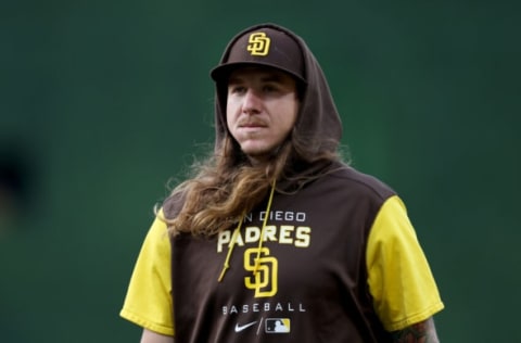 SAN DIEGO, CALIFORNIA – APRIL 22: Mike Clevinger #52 of the San Diego Padres walks to the dugout prior to a game against the Los Angeles Dodgers at PETCO Park on April 22, 2022 in San Diego, California. (Photo by Sean M. Haffey/Getty Images)