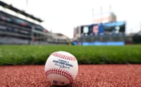 CLEVELAND, OHIO – JULY 15: An official Major League baseball sits next to the infield prior to the game between the Cleveland Guardians and the Detroit Tigers at Progressive Field on July 15, 2022 in Cleveland, Ohio. (Photo by Jason Miller/Getty Images)