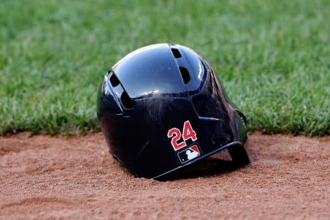 BALTIMORE, MD – JUNE 25: The batting helmet of Michael Bourn #24 of the Cleveland Indians sits on the ground before the start of the Indians and Baltimore Orioles game at Oriole Park at Camden Yards on June 25, 2013 in Baltimore, Maryland. (Photo by Rob Carr/Getty Images)