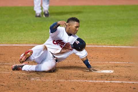 CLEVELAND, OH – SEPTEMBER 09: Jose Ramirez #62 of the Cleveland Indians slides into home during third inning against the Kansas City Royals Progressive Field on September 9, 2013 in Cleveland, Ohio. (Photo by Jason Miller/Getty Images)