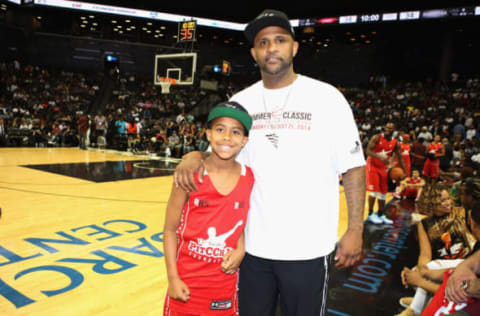 NEW YORK, NY – AUGUST 21: CC Sabathia poses with his son Carsten Charles Sabathia II at the 2014 Summer Classic Charity Basketball Game at Barclays Center on August 21, 2014 in New York City. (Photo by Jerritt Clark/Getty Images)