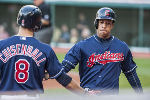 CLEVELAND, OH – MAY 6: Lonnie Chisenhall #8 of the Cleveland Indians celebrates with Michael Brantley #23 of the Cleveland Indians after Brantley scores on a hit by David Murphy #7 during the first inning against the Minnesota Twins at Progressive Field on May 6, 2014 in Cleveland, Ohio. (Photo by Jason Miller/Getty Images)