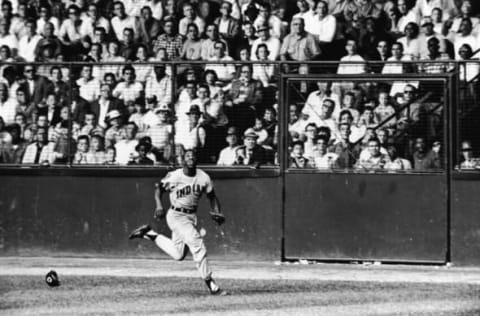 Cuban professional baseball player Minnie Minoso of the Cleveland Indians runs to catch a ball in the outfield during a road game, late 1950s. (Photo by Robert Riger Collection/Getty Images)