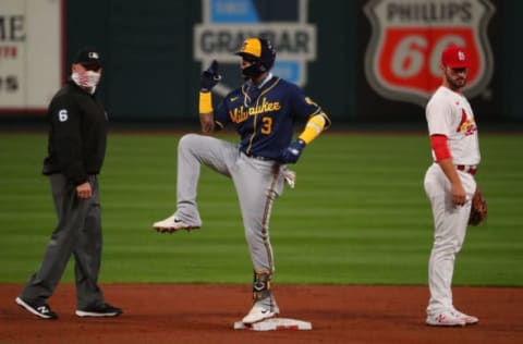 ST LOUIS, MO – SEPTEMBER 24: Orlando Arcia #3 of the Milwaukee Brewers celebrates after hitting a double against the St. Louis Cardinals as Mark Carlson #6 and Paul DeJong #11 of the St. Louis Cardinals look on in the third inning at Busch Stadium on September 24, 2020 in St Louis, Missouri. (Photo by Dilip Vishwanat/Getty Images)