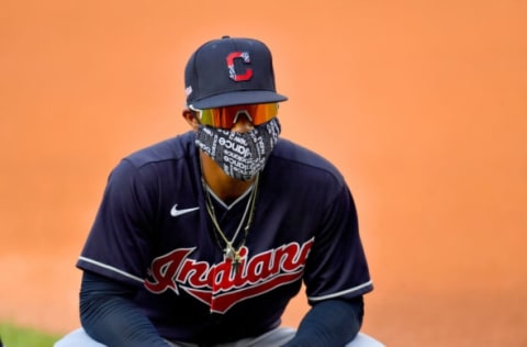 Francisco Lindor of the Cleveland Indians warms up on the field wearing a face mask prior to an intrasquad game during summer workouts at Progressive Field. (Photo by Jason Miller/Getty Images)