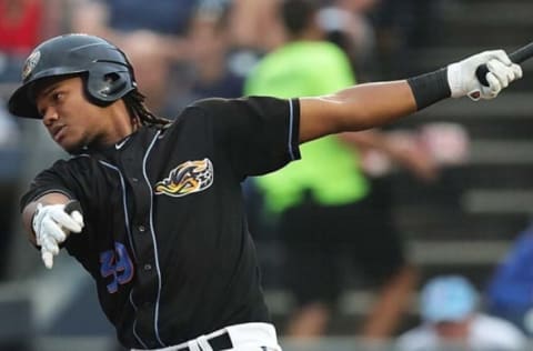 Akron RubberDucks batter Oscar Gonzalez (39) watches his hit to left field for a three-run homer during the second inning of a baseball game against the Trenton Thunder at Canal Park, Tuesday, Aug. 13, 2019 in Akron, Ohio. [Jeff Lange/Beacon Journal/Ohio.com6e66553d B451 58b6 9a86 B