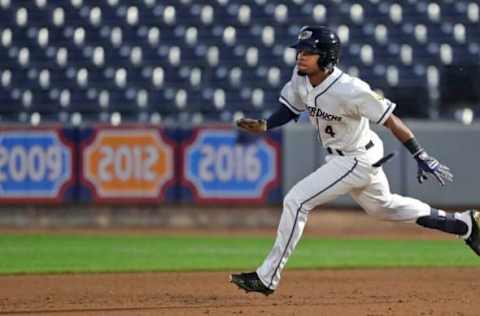 Akron RubberDucks infielder Jose Tena (4) sprints to second on a line drive to left field during the fifth inning of Game 3 of the Class AA Northeast Championship series at Canal Park, Friday, Sept. 24, 2021, in Akron, Ohio.Rubberducks 1