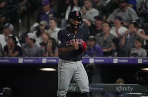 Jun 14, 2022; Denver, Colorado, USA; Cleveland Guardians shortstop Amed Rosario (1) reacts to scoring the go ahead run in the tenth inning against the Colorado Rockies at Coors Field. Mandatory Credit: Ron Chenoy-USA TODAY Sports