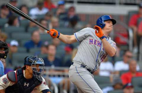 Jun 10, 2017; Atlanta, GA, USA; New York Mets right fielder Jay Bruce (19) hits a three run home run against the Atlanta Braves during the fifth inning at SunTrust Park. Mandatory Credit: Dale Zanine-USA TODAY Sports