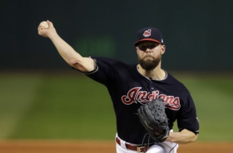 Nov 2, 2016; Cleveland, OH, USA; Cleveland Indians starting pitcher Corey Kluber throws a pitch against the Chicago Cubs in the first inning in game seven of the 2016 World Series at Progressive Field. Mandatory Credit: Gene J. Puskar/Pool Photo via USA TODAY Sports