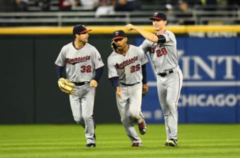 Oct 1, 2016; Chicago, IL, USA; Minnesota Twins left fielder Logan Schafer (left) and center fielder Byron Buxton (center) and right fielder Max Kepler (right) celebrate after their victory over the Chicago White Sox U.S. Cellular Field. Twins won 6-0. Mandatory Credit: Patrick Gorski-USA TODAY Sports