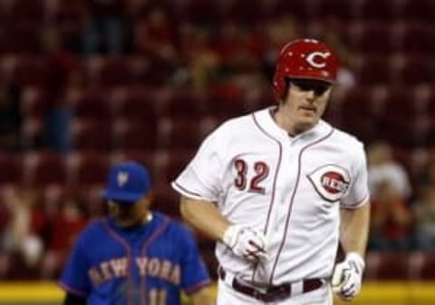 Sep 24, 2015; Cincinnati, OH, USA; Cincinnati Reds right fielder Jay Bruce (32) rounds the bases past New York Mets shortstop Ruben Tejada (11) after Bruce hit a solo home run in the eighth inning at Great American Ball Park. Mandatory Credit: David Kohl-USA TODAY Sports