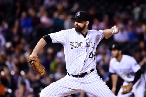 Sep 6, 2016; Denver, CO, USA; Colorado Rockies relief pitcher Boone Logan (48) delivers a pitch in the ninth inning against the San Francisco Giants at Coors Field. The Giants defeated the Rockies 3-2. Mandatory Credit: Ron Chenoy-USA TODAY Sports