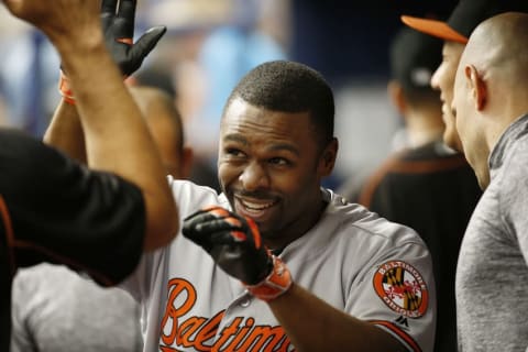 Sep 7, 2016; St. Petersburg, FL, USA; Baltimore Orioles center fielder Michael Bourn (1) is congratulated in the dugout by teammates after hitting a home run during the third inning against the Tampa Bay Rays against the Tampa Bay Rays at Tropicana Field. Mandatory Credit: Kim Klement-USA TODAY Sports