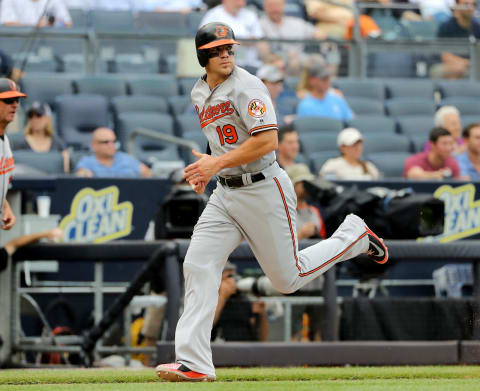 NEW YORK, NY – AUGUST 01: Chris Davis #19 of the Baltimore Orioles scores in the second inning against the New York Yankees at Yankee Stadium on August 1, 2018 in the Bronx borough of New York City. (Photo by Elsa/Getty Images)