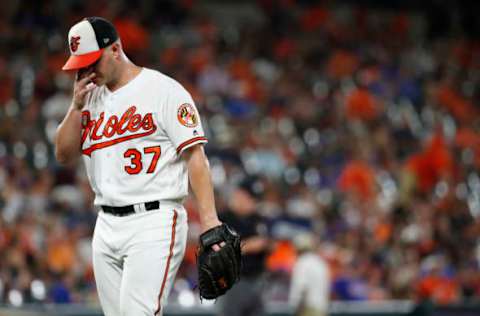 BALTIMORE, MD – AUGUST 15: Starting pitcher Dylan Bundy #37 of the Baltimore Orioles reacts as he is relieved in the sixth inning against the New York Mets at Oriole Park at Camden Yards on August 15, 2018 in Baltimore, Maryland. (Photo by Patrick McDermott/Getty Images)