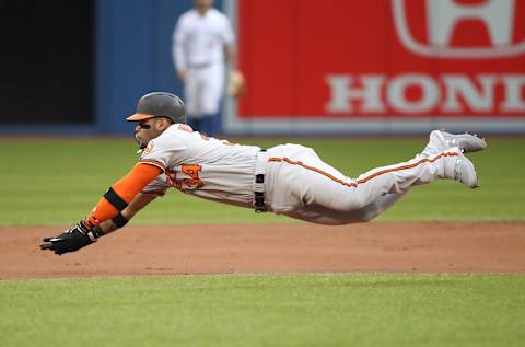 TORONTO, ON – AUGUST 20: Jonathan Villar #34 of the Baltimore Orioles steals second base in the first inning during MLB game action against the Toronto Blue Jays at Rogers Centre on August 20, 2018 in Toronto, Canada. (Photo by Tom Szczerbowski/Getty Images)