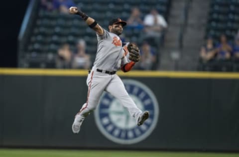 SEATTLE, WA – SEPTEMBER 5: Second baseman Jonathan Villar #2 of the Baltimore Orioles throws to first base after fielding a ball hit by Denard Span #4 of the Seattle Mariners during the second inning of a game at Safeco Field on September 5, 2018 in Seattle, Washington. Span was safe on play with an infield single. (Photo by Stephen Brashear/Getty Images)