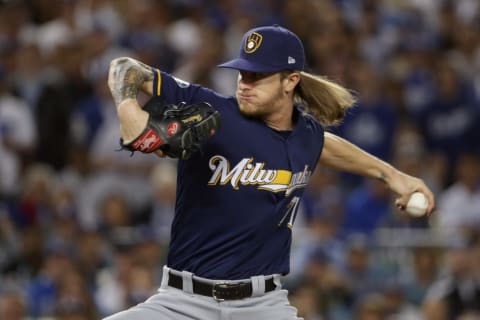 LOS ANGELES, CA – OCTOBER 16: Pitcher Josh Hader #71 of the Milwaukee Brewers pitches during the eighth inning of Game Four of the National League Championship Series against the Los Angeles Dodgers at Dodger Stadium on October 16, 2018 in Los Angeles, California. (Photo by Jeff Gross/Getty Images)