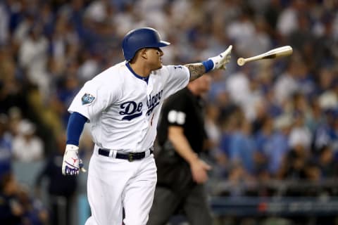 LOS ANGELES, CA – OCTOBER 26: Manny Machado #8 of the Los Angeles Dodgers hits a sixth inning single off the wall against the Boston Red Sox in Game Three of the 2018 World Series at Dodger Stadium on October 26, 2018 in Los Angeles, California. (Photo by Ezra Shaw/Getty Images)