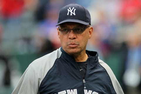 ARLINGTON, TX – OCTOBER 22: Baseball Hall of Famer Reggie Jackson looks on during batting prior to the New York Yankees playing against the Texas Rangers in Game Six of the ALCS during the 2010 MLB Playoffs at Rangers Ballpark in Arlington on October 22, 2010 in Arlington, Texas. (Photo by Stephen Dunn/Getty Images)