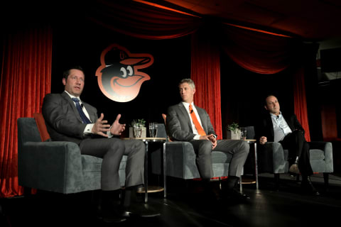 BALTIMORE, MD – NOVEMBER 19: Louis Angelos (L) and John Angelos (R) of the Baltimore Orioles look on after introducing Mike Elias (C) to the media as the Orioles Executive Vice President and General Manager during a news conference at Oriole Park at Camden Yards on November 19, 2018 in Baltimore, Maryland. (Photo by Rob Carr/Getty Images)