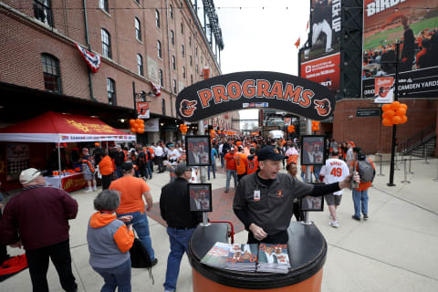 BALTIMORE, MARYLAND – APRIL 04: A vendor sells programs before the start of the Baltimore Orioles and New York Yankees game at Oriole Park at Camden Yards on April 04, 2019 in Baltimore, Maryland. (Photo by Rob Carr/Getty Images)