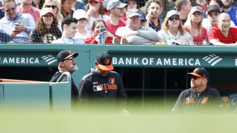 BOSTON, MASSACHUSETTS – APRIL 14: Pitching coach Doug Brocail #26 of the Baltimore Orioles, left, is ejected from the game against the Boston Red Sox in the bottom of the sixth inning at Fenway Park on April 14, 2019 in Boston, Massachusetts. (Photo by Omar Rawlings/Getty Images)