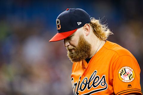 TORONTO, ONTARIO – JULY 6: Andrew Cashner #54 of the Baltimore Orioles comes off the mound against Toronto Blue Jays at the end of the sixth inning during their MLB game at the Rogers Centre on July 6, 2019 in Toronto, Canada. (Photo by Mark Blinch/Getty Images)