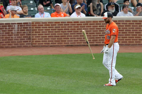 BALTIMORE, MARYLAND – JUNE 15: Chris Davis #19 of the Baltimore Orioles flips his bat after striking out looking for the third out of the eighth inning against the Boston Red Sox at Oriole Park at Camden Yards on June 15, 2019 in Baltimore, Maryland. (Photo by Rob Carr/Getty Images)