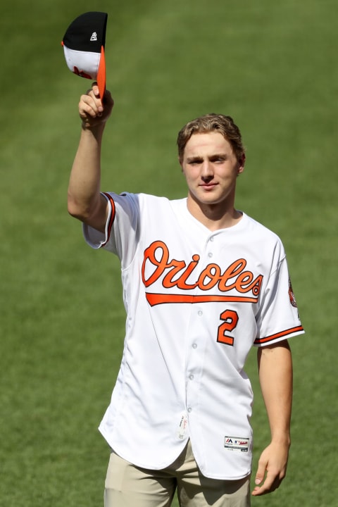 BALTIMORE, MARYLAND – JUNE 26: Gunnar Henderson, the Baltimore Orioles second round draft pick, waves to the crowd after being introduce during the third inning of the Orioles and San Diego Padres game at Oriole Park at Camden Yards on June 26, 2019 in Baltimore, Maryland. (Photo by Rob Carr/Getty Images)