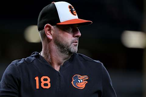 BALTIMORE, MD – AUGUST 10: Manager Brandon Hyde #18 of the Baltimore Orioles looks on during the game against the Houston Astros at Oriole Park at Camden Yards on August 10, 2019 in Baltimore, Maryland. (Photo by Will Newton/Getty Images)