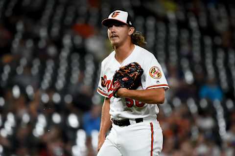 BALTIMORE, MD – AUGUST 20: Hunter Harvey #56 of the Baltimore Orioles walks off the field between innings against the Kansas City Royals at Oriole Park at Camden Yards on August 20, 2019 in Baltimore, Maryland. (Photo by Will Newton/Getty Images)