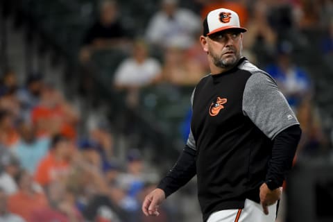 BALTIMORE, MD – SEPTEMBER 12: Manager Brandon Hyde #18 of the Baltimore Orioles walks off the field during the game against the Los Angeles Dodgers at Oriole Park at Camden Yards on September 12, 2019 in Baltimore, Maryland. (Photo by Will Newton/Getty Images)