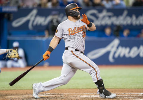 TORONTO, ONTARIO – SEPTEMBER 24: DJ Stewart #24 of the Baltimore Orioles hits a home run against the Toronto Blue Jays in the sixth inning during their MLB game at the Rogers Centre on September 24, 2019 in Toronto, Canada. (Photo by Mark Blinch/Getty Images)