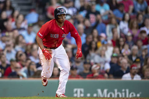 BOSTON, MA – SEPTEMBER 29: Rafael Devers #11 of the Boston Red Sox hits a double during the seventh inning of a game against the Baltimore Orioles on September 29, 2019 at Fenway Park in Boston, Massachusetts. It was his 200th hit of the season. (Photo by Billie Weiss/Boston Red Sox/Getty Images)