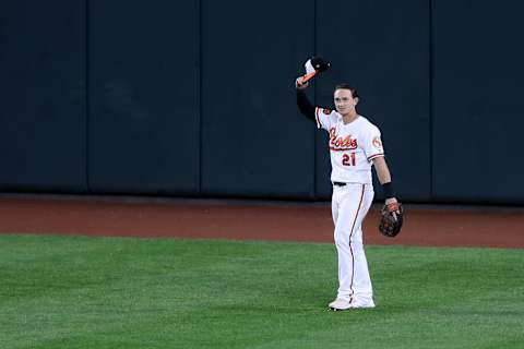 BALTIMORE, MARYLAND – SEPTEMBER 19: Austin Hays #21 of the Baltimore Orioles tips his hat to the crowd after robbing Vladimir Guerrero Jr. #27 of the Toronto Blue Jays (not pictured) of a home run in the fourth inning at Oriole Park at Camden Yards on September 19, 2019 in Baltimore, Maryland. (Photo by Rob Carr/Getty Images)