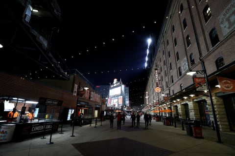 BALTIMORE, MARYLAND – SEPTEMBER 19: Fans walk along Eutaw Street in the outfield during the Baltimore Orioles and Toronto Blue Jays game at Oriole Park at Camden Yards on September 19, 2019 in Baltimore, Maryland. (Photo by Rob Carr/Getty Images)