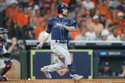 HOUSTON, TEXAS – OCTOBER 04: Brandon Lowe #8 of the Tampa Bay Rays singles in the fifth inning against the Houston Astros in game one of the American League Division Series at Minute Maid Park on October 04, 2019 in Houston, Texas. (Photo by Bob Levey/Getty Images)