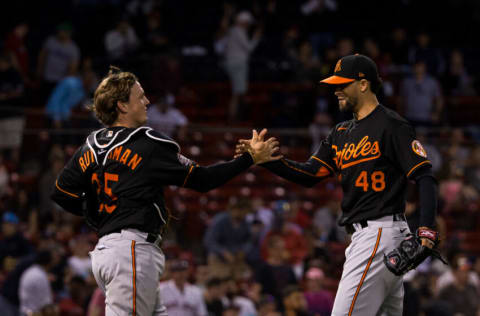 Jorge Lopez #48 of the Baltimore Orioles and teammate Adley Rutschman #35 celebrate. (Photo by Rich Gagnon/Getty Images)