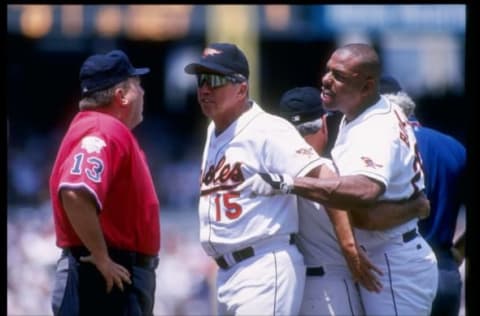 6 Jul 1996: Outfielder Bobby Bonilla of the Baltimore Orioles (right) restrains his manager Davey Johnson during a confrontation with the umpire in a game against the the Boston Red Sox at Oriole Park at Camden Yards in Baltimore, Maryland. The Orioles won the game 4-3. Mandatory Credit: Doug Pensinger /Allsport