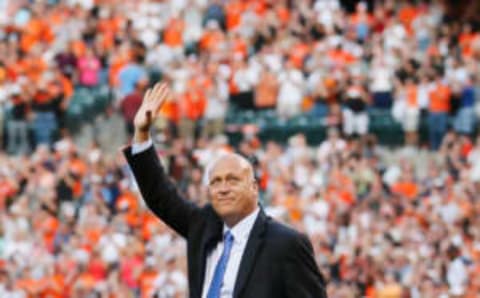 BALTIMORE, MD – SEPTEMBER 06: Hall of fame player and former Baltimore Orioles Cal Ripken Jr. waves to the crowd before throwing out the ceremonial first pitch before the start of the Orioles and New York Yankees game at Oriole Park at Camden Yards on September 6, 2012 in Baltimore, Maryland. (Photo by Rob Carr/Getty Images)