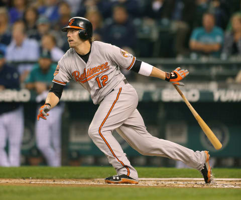 SEATTLE, WA – SEPTEMBER 17: Mark Reynolds #12 of the Baltimore Orioles hits an RBI single in the first inning against the Seattle Mariners at Safeco Field on September 17, 2012 in Seattle, Washington. (Photo by Otto Greule Jr/Getty Images)