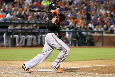 ARLINGTON, TX – OCTOBER 05: Chris Davis #19 of the Baltimore Orioles hits a single in the top of the sixth inning against the Texas Rangers during the American League Wild Card playoff game at Rangers Ballpark in Arlington on October 5, 2012 in Arlington, Texas. (Photo by Ronald Martinez/Getty Images)