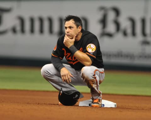 ST. PETERSBURG, FL – SEPTEMBER 20: Infielder Brian Roberts #1 of the Baltimore Orioles crouches at 2nd base while the Tampa Bay Rays change pitchers September 20, 2013 at Tropicana Field in St. Petersburg, Florida. (Photo by Al Messerschmidt/Getty Images)