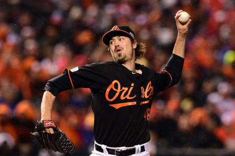 BALTIMORE, MD – OCTOBER 10: Andrew Miller #48 of the Baltimore Orioles throws a pitch in the eighth inning against Alex Gordon #4 of the Kansas City Royals during Game One of the American League Championship Series at Oriole Park at Camden Yards on October 10, 2014 in Baltimore, Maryland. (Photo by Patrick Smith/Getty Images)