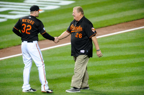 BALTIMORE, MD – OCTOBER 10: Former major league first baseman for the Baltimore Orioles John Wesley “Boog” Powell talks with Matt Wieters #32 of the Baltimore Orioles prior to the first pitch before Game One of the American League Championship Series against the Kansas City Royals at Oriole Park at Camden Yards on October 10, 2014 in Baltimore, Maryland. (Photo by Mitchell Layton/Getty Images)