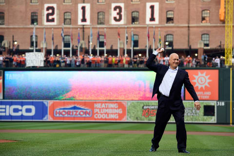 BALTIMORE, MD – SEPTEMBER 01: Hall of fame player and former Baltimore Orioles Cal Ripken Jr. throws out the ceremonial first pitch prior to the start of an MLB game between the Tampa Bay Rays and Baltimore Orioles at Oriole Park at Camden Yards on September 1, 2015 in Baltimore, Maryland. The Orioles are celebrating the 20th anniversary of Ripken’s record-breaking 2,131st consecutive games played when he passed New York Yankees Lou Gehrig on September 6, 1995. (Photo by Patrick McDermott/Getty Images)As three outstanding ball players are inducted into the National Baseball Hall of Fame, it is fitting to look back at the Baltimore Orioles who are permanently enshrined in Cooperstown.