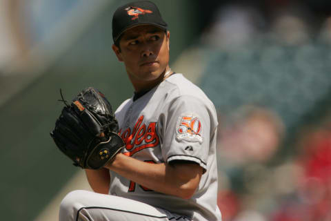 ANAHEIM, CA – AUGUST 12: Rodrigo Lopez #19 of the Baltimore Orioles winds back to pitch during the game against the Anaheim Angels on August 12, 2004 at Angel Stadium in Anaheim, California. The Orioles won 6-1. (Photo by Stephen Dunn/Getty Images)