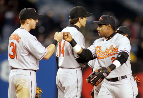 BRONX, NY – APRIL 8: Sammy Sosa #21 and Jay Gibbons #31 of the Baltimore Orioles touch fists in celebration of their victory over the New York Yankees at Yankee Stadium on April 8, 2005 in Bronx, New York. The Orioles defeated the Yankees 12-5. (Photo by Jim McIsaac/Getty Images)